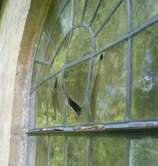 The window at St Kenelm's, Sapperton, before repairs